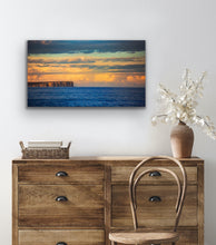 Load image into Gallery viewer, Soft afternoon light illuminates the distant cliffs and clouds across the bay's blue waters. Jervis Bay, NSW.