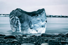 Load image into Gallery viewer, Jökulsárlónn, Iceland, I was captivated by the faceted colours of this particularly beautiful block of ice, one of thousands broken off from the main glacier, and now floating out to sea from the lagoon. Peter Izzard Photography Fine Art Print. 
